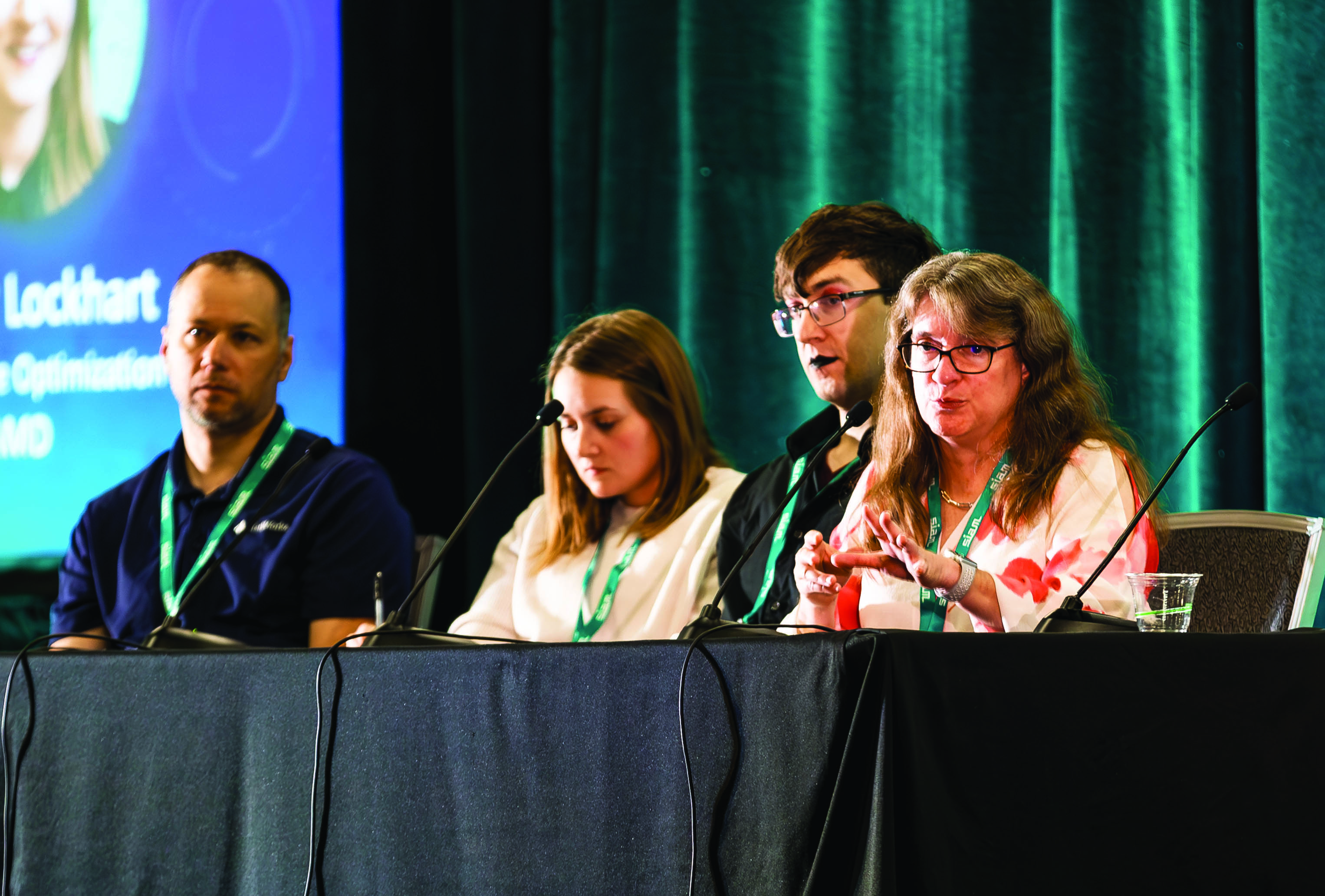 During the 2024 SIAM Annual Meeting, which was held this July in Spokane, Wash., a panel of researchers at various stages of their careers discussed their employment journeys in academia, industry, and the national laboratories. From left to right: panelists Cosmin Ionita of MathWorks, Shelby Lockhart of AMD, Jason Torchinsky of Sandia National Laboratories, and Carol Woodward of Lawrence Livermore National Laboratory. SIAM photo.