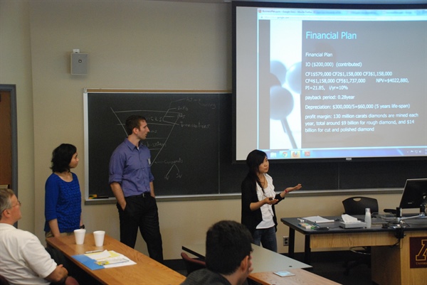 Student team members (from left) Elizabeth Lam (Toronto), Drew Swartz (Purdue), and Lei Ge (Central Florida) make a business pitch.