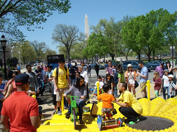 MoMath exhibit "Pedal on the Petals," operated by student volunteers. Photo by Byong Kwon.