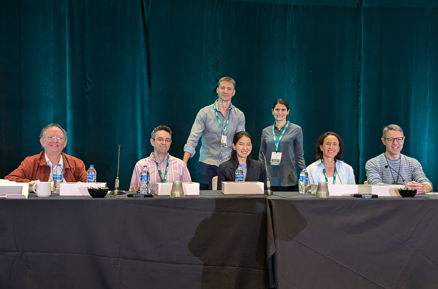 A panel of researchers who work at the intersection of applied mathematics and other fields discussed the challenges and opportunities of interdisciplinary projects during a session at the 2025 SIAM Conference on Applications of Dynamical Systems, which took place in Denver, Colo., this past May. From left to right: Chris Budd of the University of Bath, Daniel Abrams of Northwestern University, session chair Igor Belykh of Georgia State University, Mari Kawakatsu of the University of Pennsylvania, session chair Cecilia Diniz Behn of the Colorado School of Mines, Dorit Hammerling of the Colorado School of Mines, and Jonathan Rubin of the University of Pittsburgh. SIAM photo.