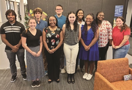 Student participants of the 2023 SIAM-Simons Undergraduate Summer Research Program visited the Simons Foundation’s Flatiron Institute in New York City to meet one another, present their projects, tour the facility, and interact with a panel of researchers. Drake Lewis of Kenyon College is on the far left and author Rachel Ahumada of Azusa Pacific University is second from left. Photo courtesy of Karen Bliss.