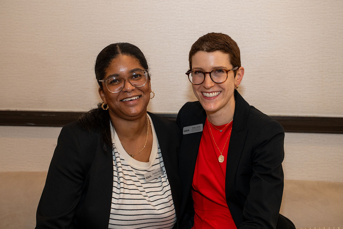 SIAM Senior Development Officer Aleisha Kehm (left) and SIAM Director of Development and Corporate Relations Abby Addy pose during the Donor Appreciation Reception at the Third Joint SIAM/CAIMS Annual Meetings, which took place this past summer in Montréal, Québec, Canada. SIAM photo.