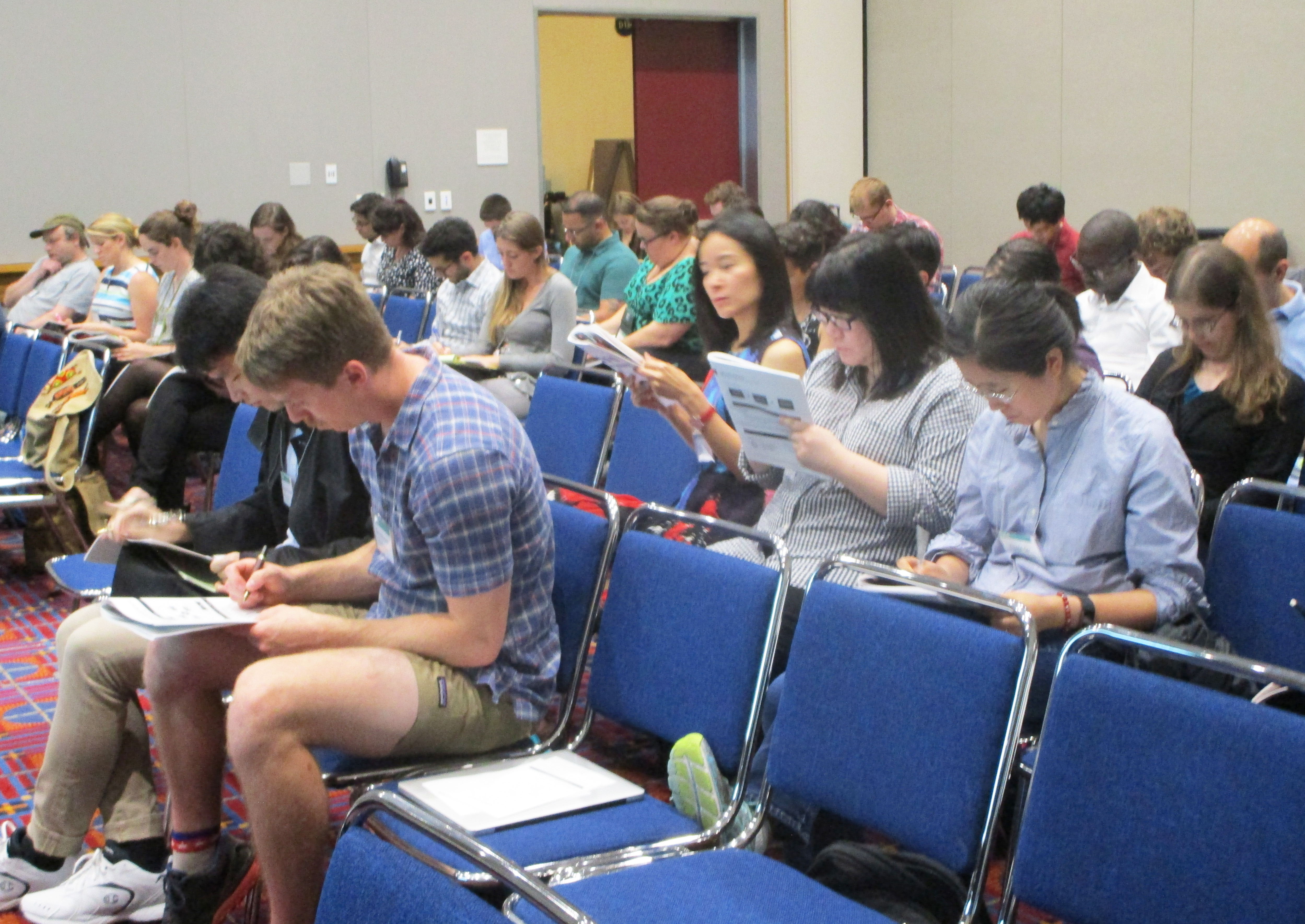 Graduate students and postdoctoral researchers think about their core values and support networks during the Professional Development Evening at the 2018 SIAM Annual Meeting, held in Portland, Ore., last July. SIAM photo.