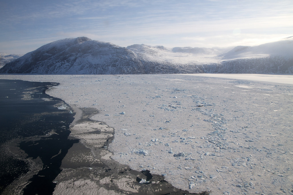 &lt;strong&gt;Figure 1.&lt;/strong&gt; Sea ice off the coast of Greenland, which has been diminished by warming Arctic temperatures. The infusion of cold water into the ocean risks disrupting the Atlantic meridional overturning circulation. Public domain image courtesy of NASA.