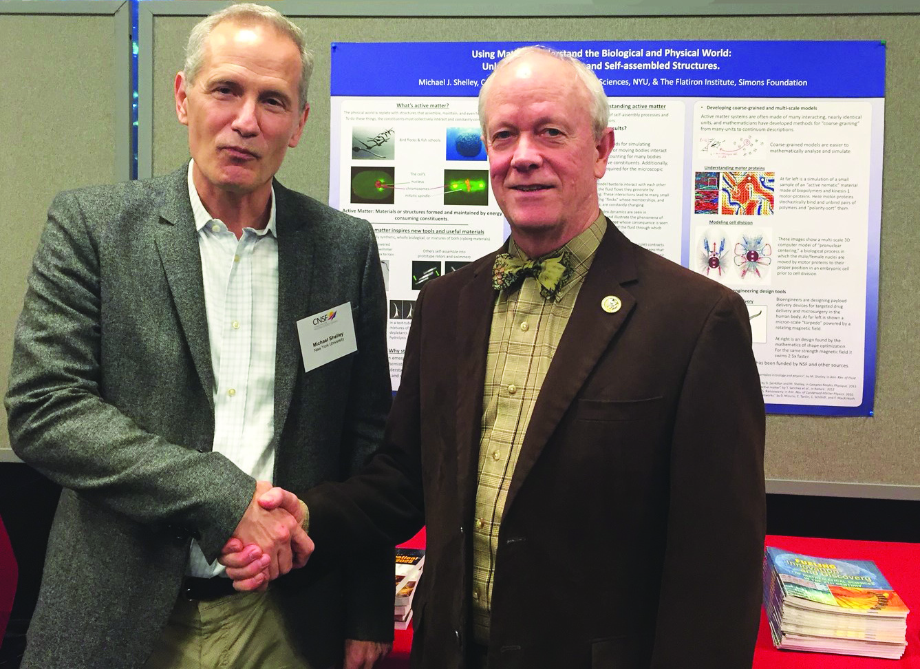 Mike Shelley (left) shakes hands with Representative Jerry McNerney (D-CA) at the recent 23rd CNSF Capitol Hill Exhibition, which was held this May in Washington, D.C. Photo credit: Miriam Quintal.