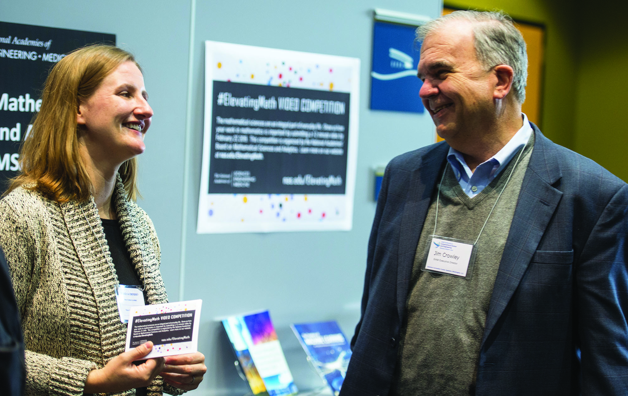 Jim Crowley (right) converses with Michelle Schwalbe (National Academies of Sciences, Engineering, and Medicine) at the 2019 SIAM Conference on Computational Science and Engineering, which took place last year in Spokane, Wash. SIAM photo.