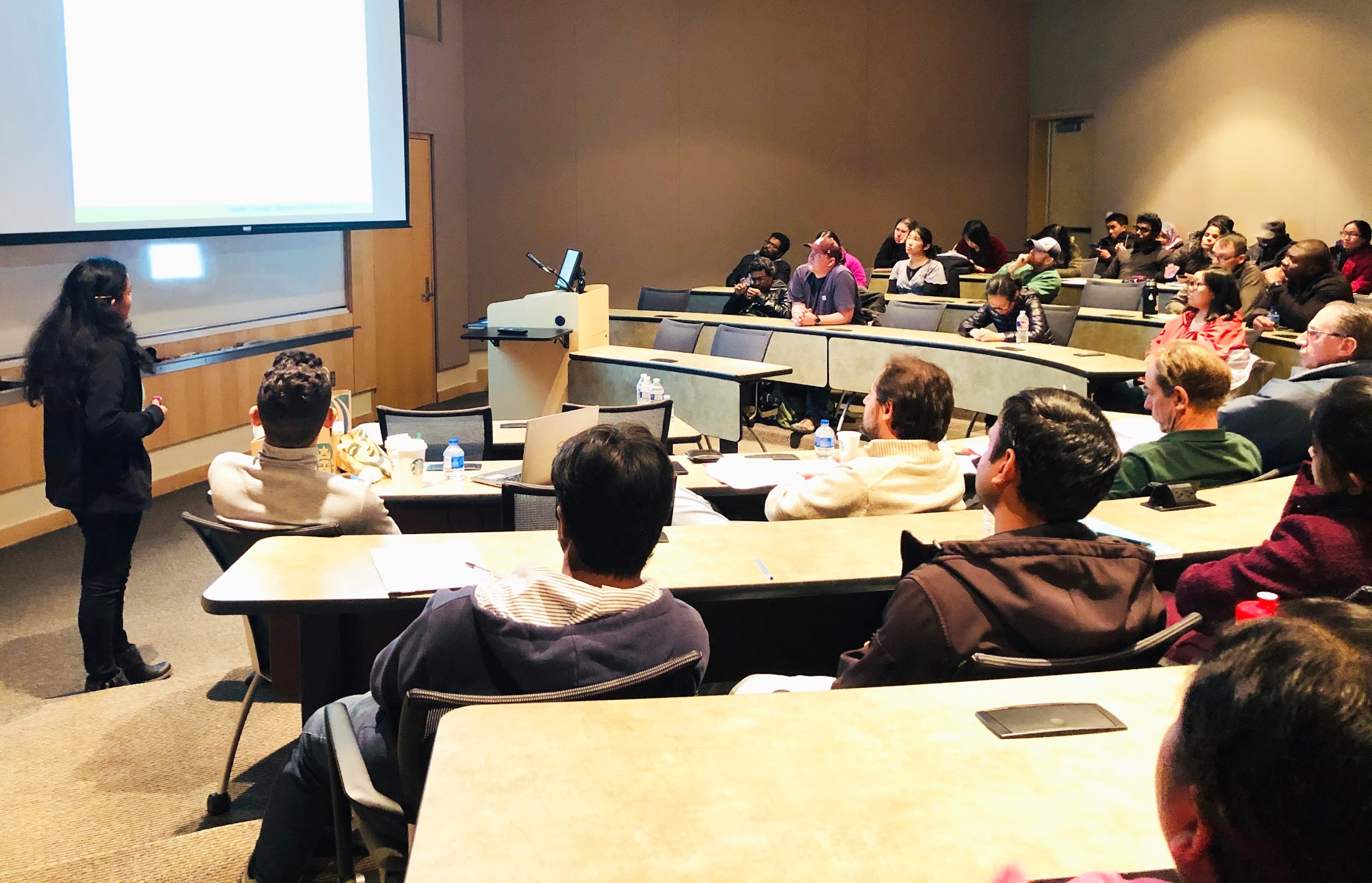 Attendees of the Texas Tech University Chapter of SIAM’s “Graduate Student Research Days” competition watch students present their research. Photo courtesy of Isuru Dassanayake.