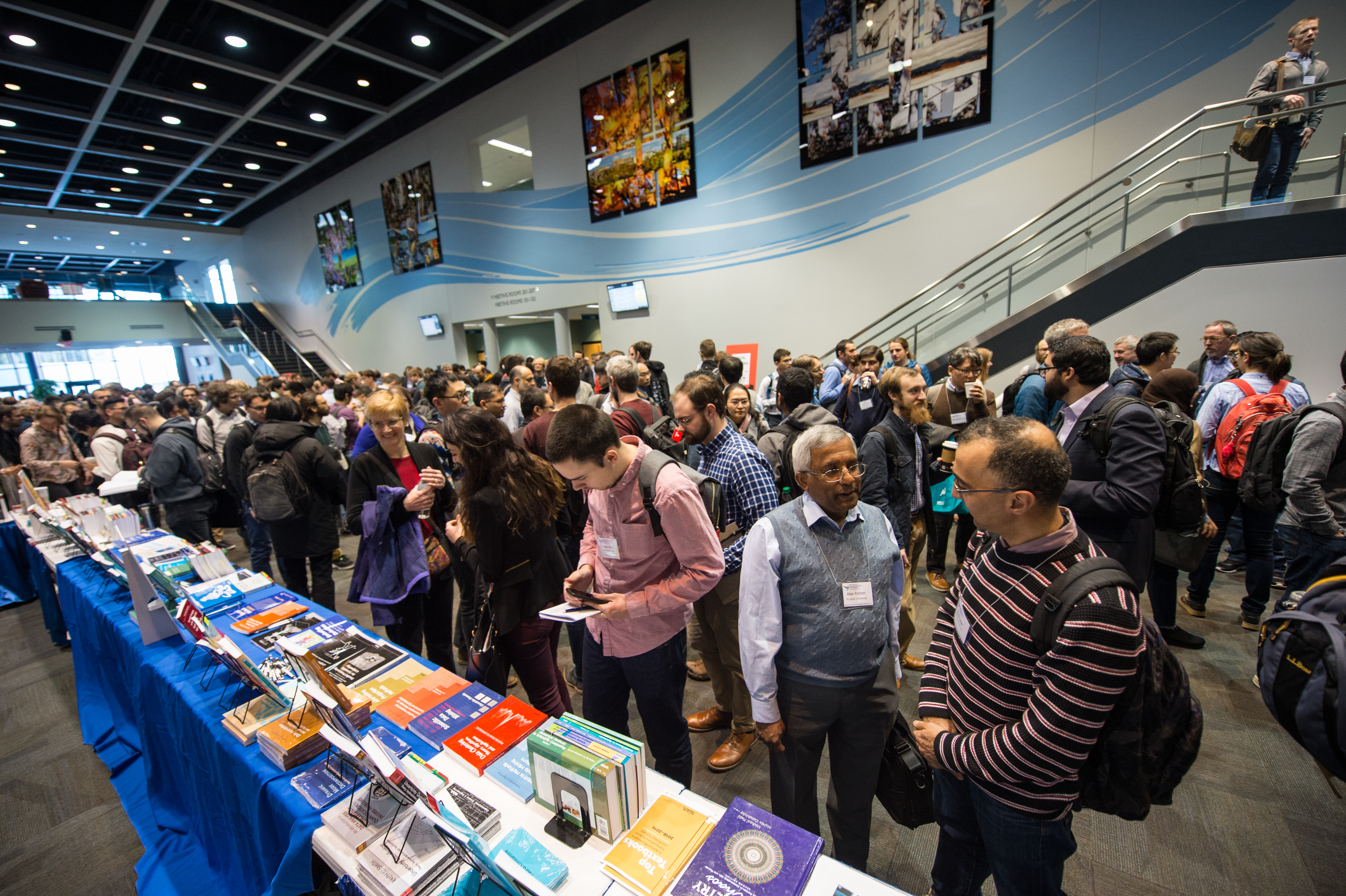 Attendees of the 2019 SIAM Conference on Computational Science and Engineering—which took place last February in Spokane, Wash., and was SIAM’s largest meeting to date—mix and mingle between sessions. SIAM photo.