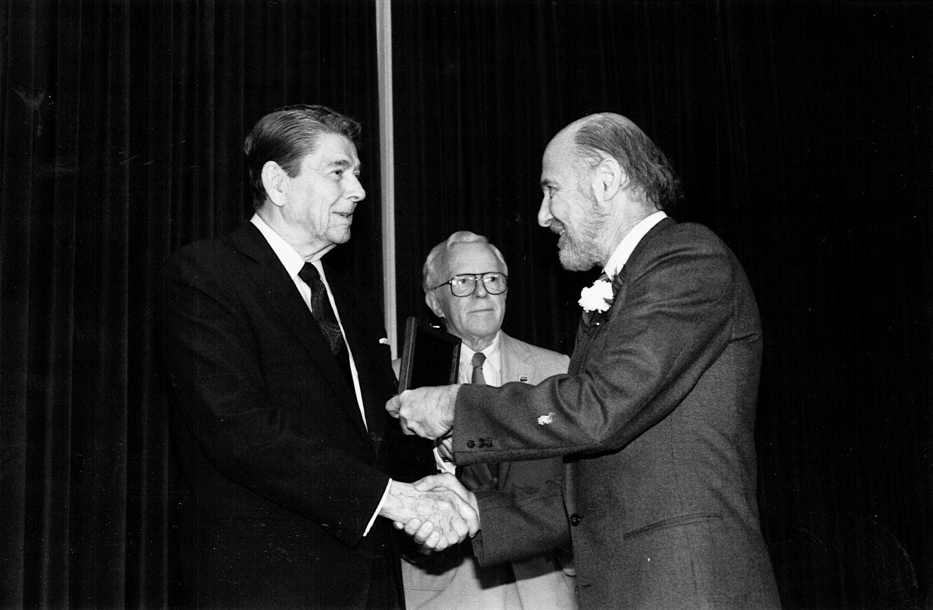 President Ronald Raegan (left) presents Joe Keller with the National Medal of Science during a White House ceremony on July 15, 1988. Joe received the award &quot;for his outstanding contribution to the geometrical theory of diffraction. This is a major extension of geometrical optics which succeeds, after many centuries, in adding the physics of diffraction to the simple ray concepts of optics and of other wave motions.&quot;
