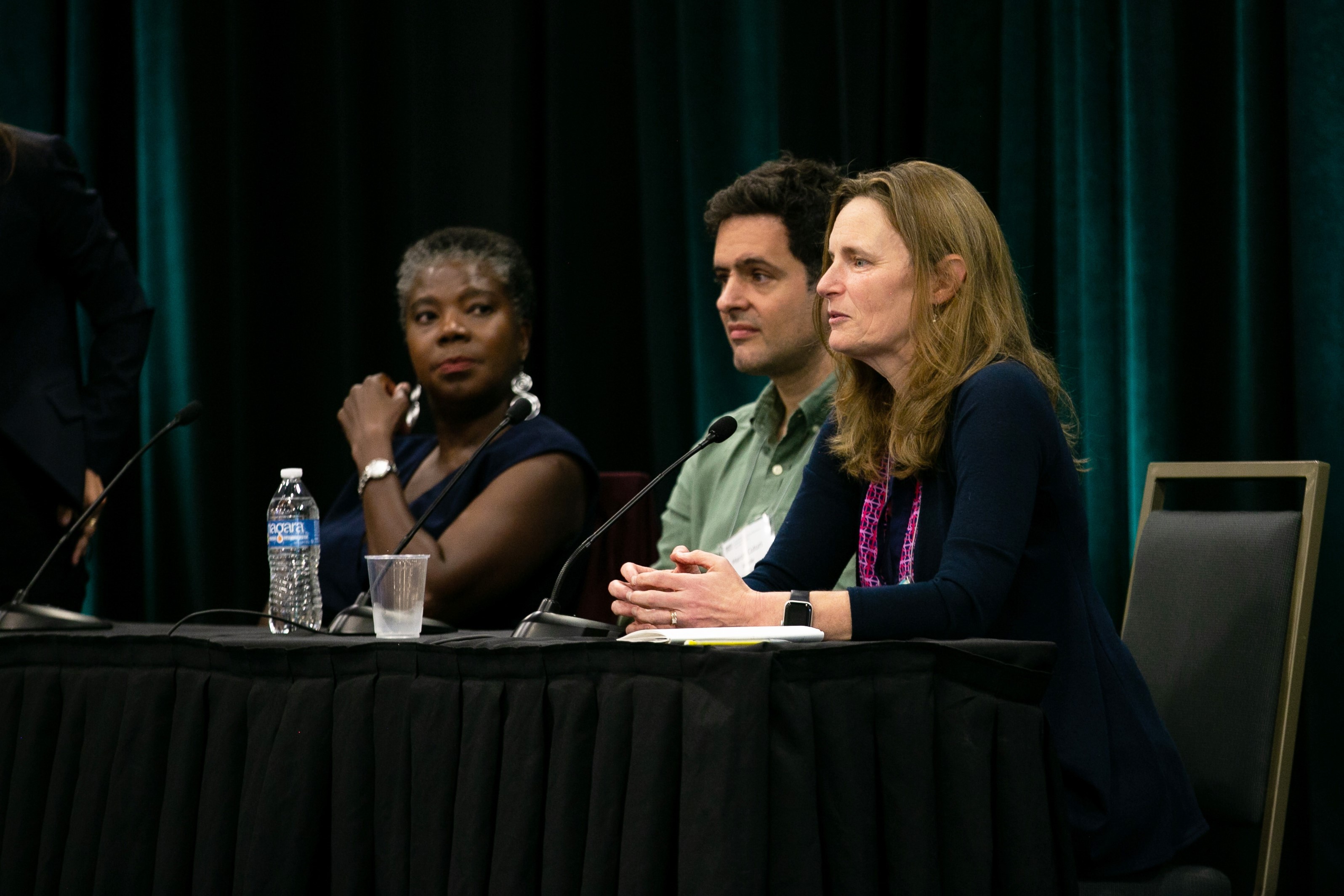 From left to right: Suzanne Weekes (executive director of SIAM), Marco Cuturi (Apple, Inc.), and Tamara Kolda (MathSci.ai) talk about their respective career experiences and share useful advice and personal anecdotes with junior applied mathematicians and computational scientists during a panel discussion at the 2022 SIAM Conference on Mathematics of Data Science, which took place in San Diego, Calif., this September. SIAM photo.