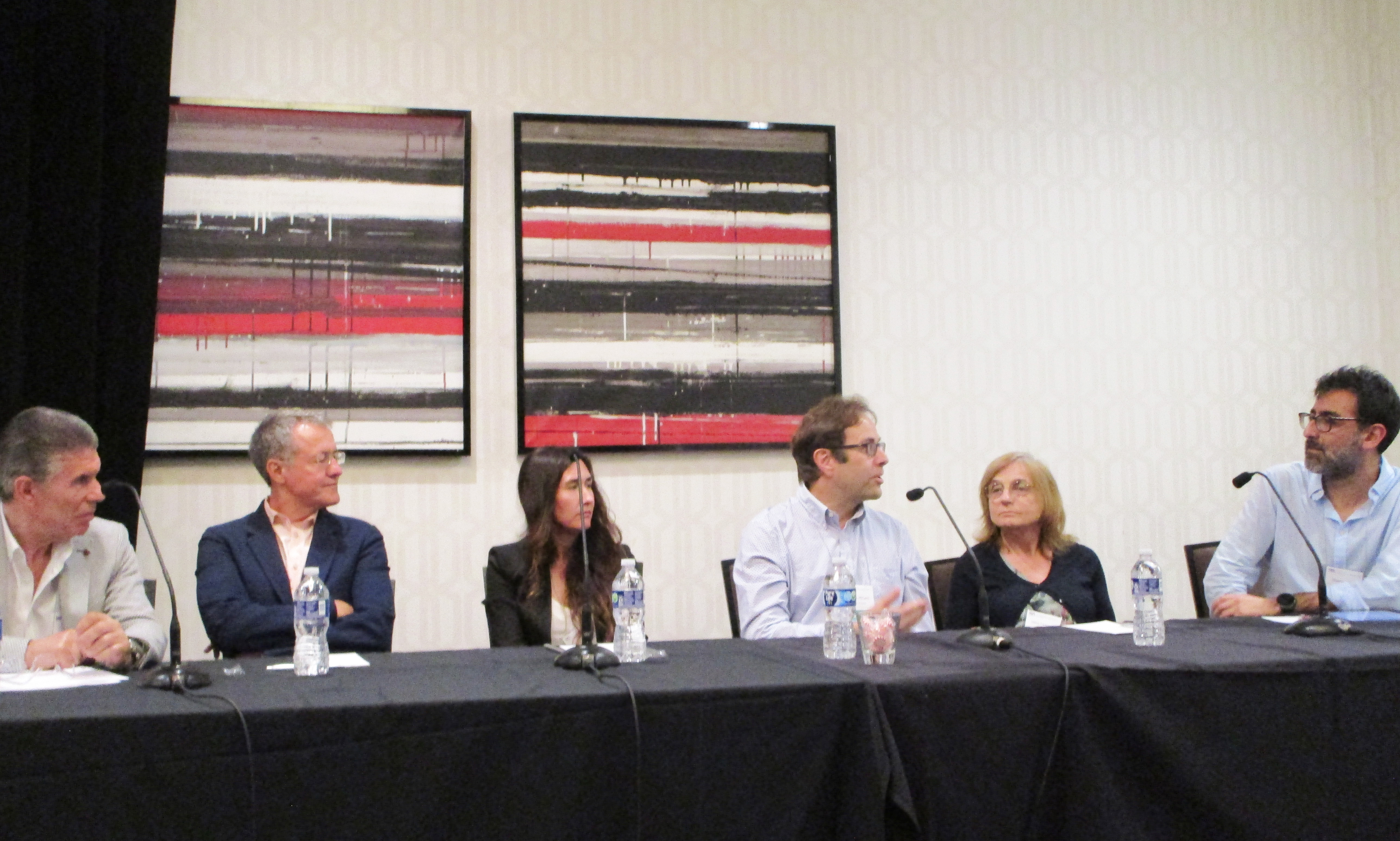 A panel of researchers discussed future directions of control theory and applied mathematics at the 2023 SIAM Conference on Control and Its Applications, which took place in Philadelphia, Pa., this July. From left to right: Eduardo Casas (Universidad de Cantabria), Benedetto Piccoli (Rutgers University), Sonia Martinez (University of California, San Diego), Robert McCann (University of Toronto), Hélène Frankowska (Sorbonne Université and CNRS), and Eduardo Cerpa (Pontificia Universidad Católica de Chile). SIAM photo.