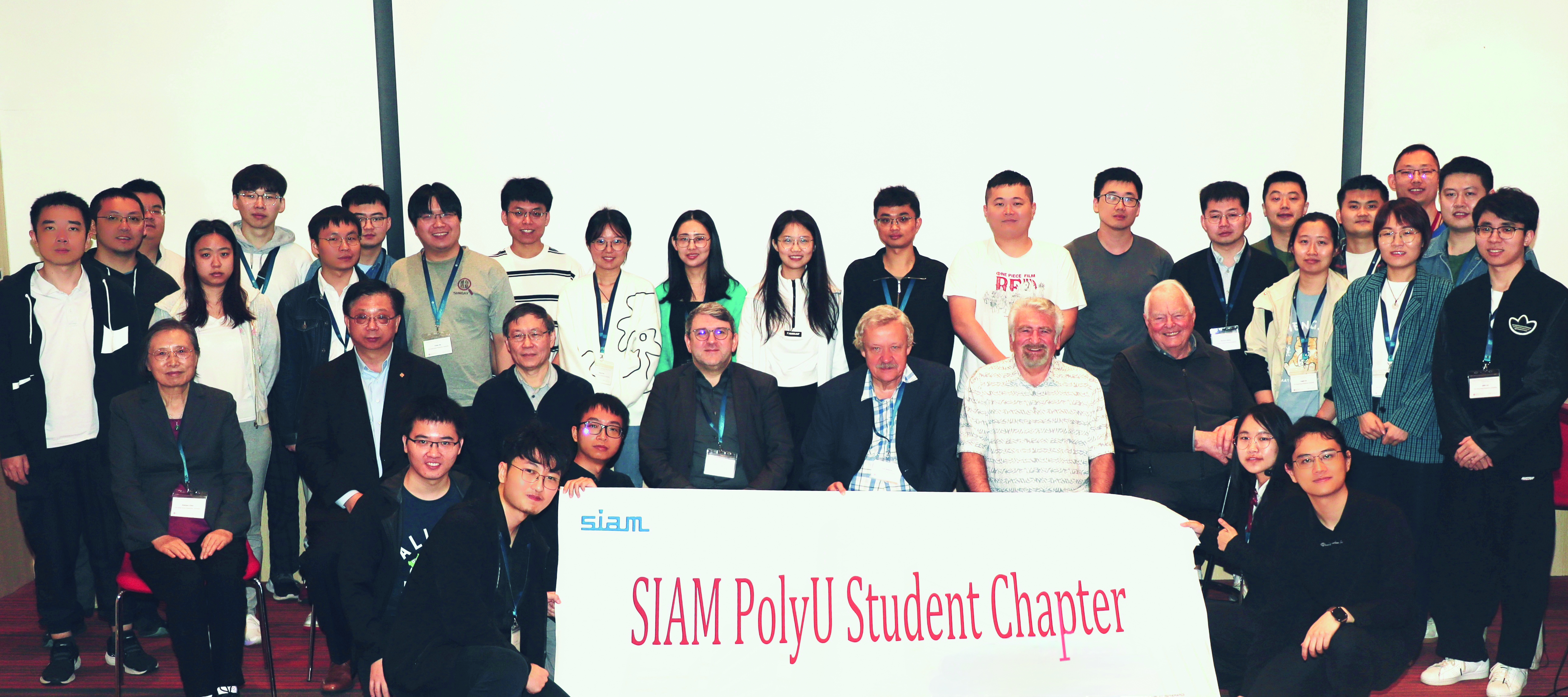 Speakers and participants gather for a group photo at the Hong Kong Polytechnic University (PolyU) SIAM Student Chapter event, “Dialogue with World-leading Scholars,” which took place during the three-day Workshop on Nonsmooth Optimization and Variational Analysis at PolyU in December 2023. Photo courtesy of Eric Lam Kwok-lung and Peter Lo Charn-tong.