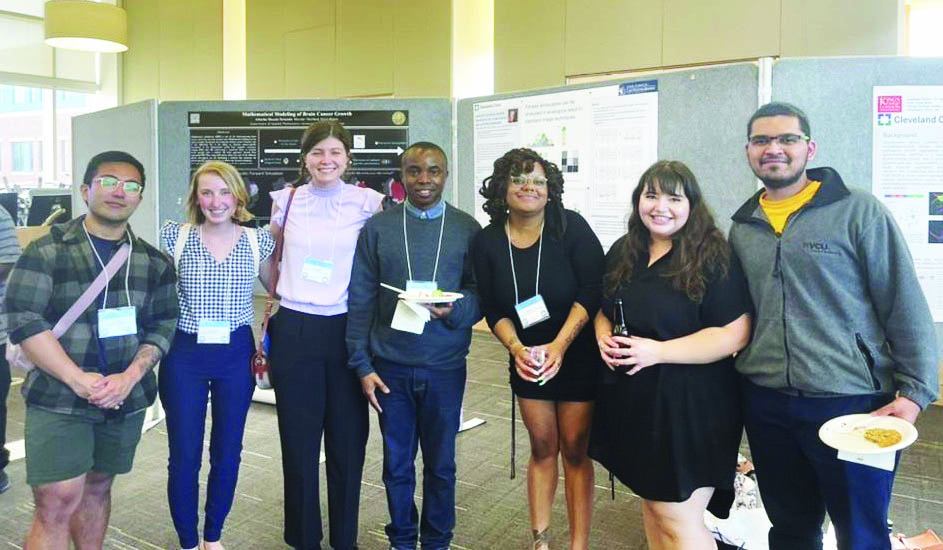 Several Virginia Commonwealth University (VCU) SIAM Student Chapter members pose at the 2022 Biology and Medicine Through Mathematics Conference, which took place at VCU in May 2022. Photo courtesy of the VCU SIAM Student Chapter.