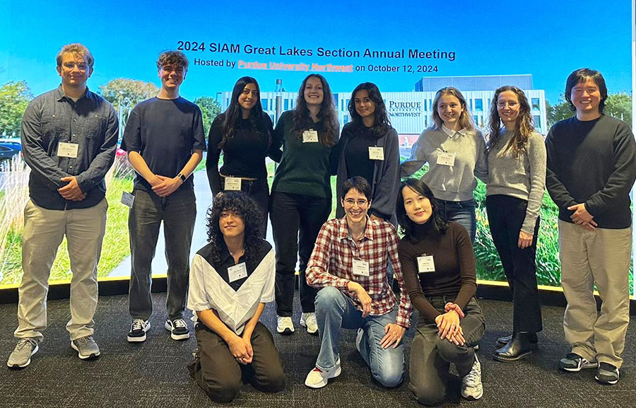 Members of the Loyola University Chicago (LUC) SIAM Student Chapter attend the 2024 SIAM Great Lakes Section Annual Meeting, which took place at Purdue University Northwest in October 2024. Photo courtesy of the LUC SIAM Student Chapter.