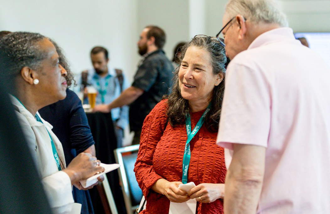 From left to right: Bonita Saunders (National Institute of Standards and Technology), Rachel Levy (North Carolina State University), and SIAM Treasurer Sam Gubins (Annual Reviews Investment Corporation) converse during the Donor Appreciation Reception at the 2024 SIAM Annual Meeting, which took place in July 2024 in Spokane, Wash. SIAM photo.