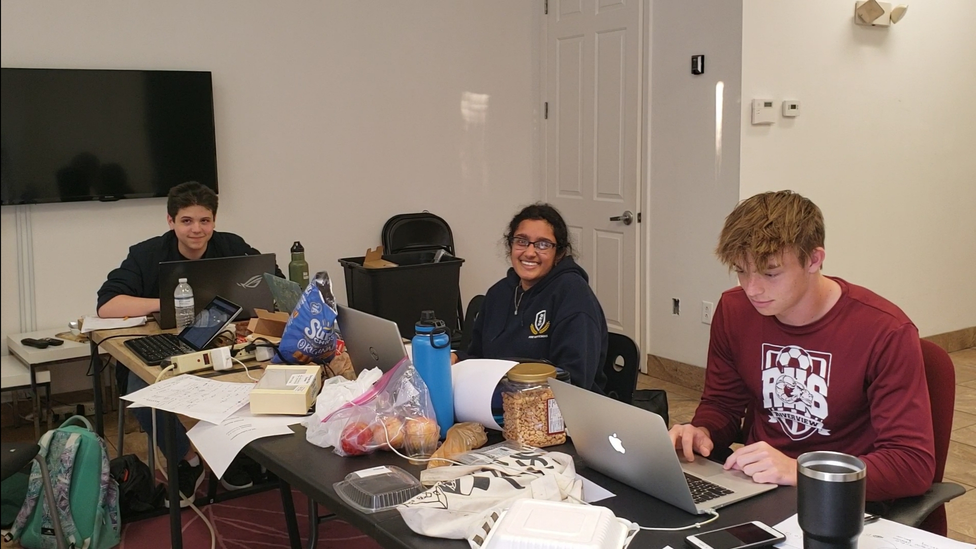 From left to right: Nicholas Butakow, Pragnya Govindu, and Kristoffer Selberg of Pine View School in Osprey, Fla., tackle the 2020 MathWorks Math Modeling Challenge trucking problem during Challenge weekend. The Pine View team, which also included Christiana Guan and Michael Gutierrez, took home $20,000 in scholarship funds for their first-place finish. Photo courtesy of Mark Mattia.