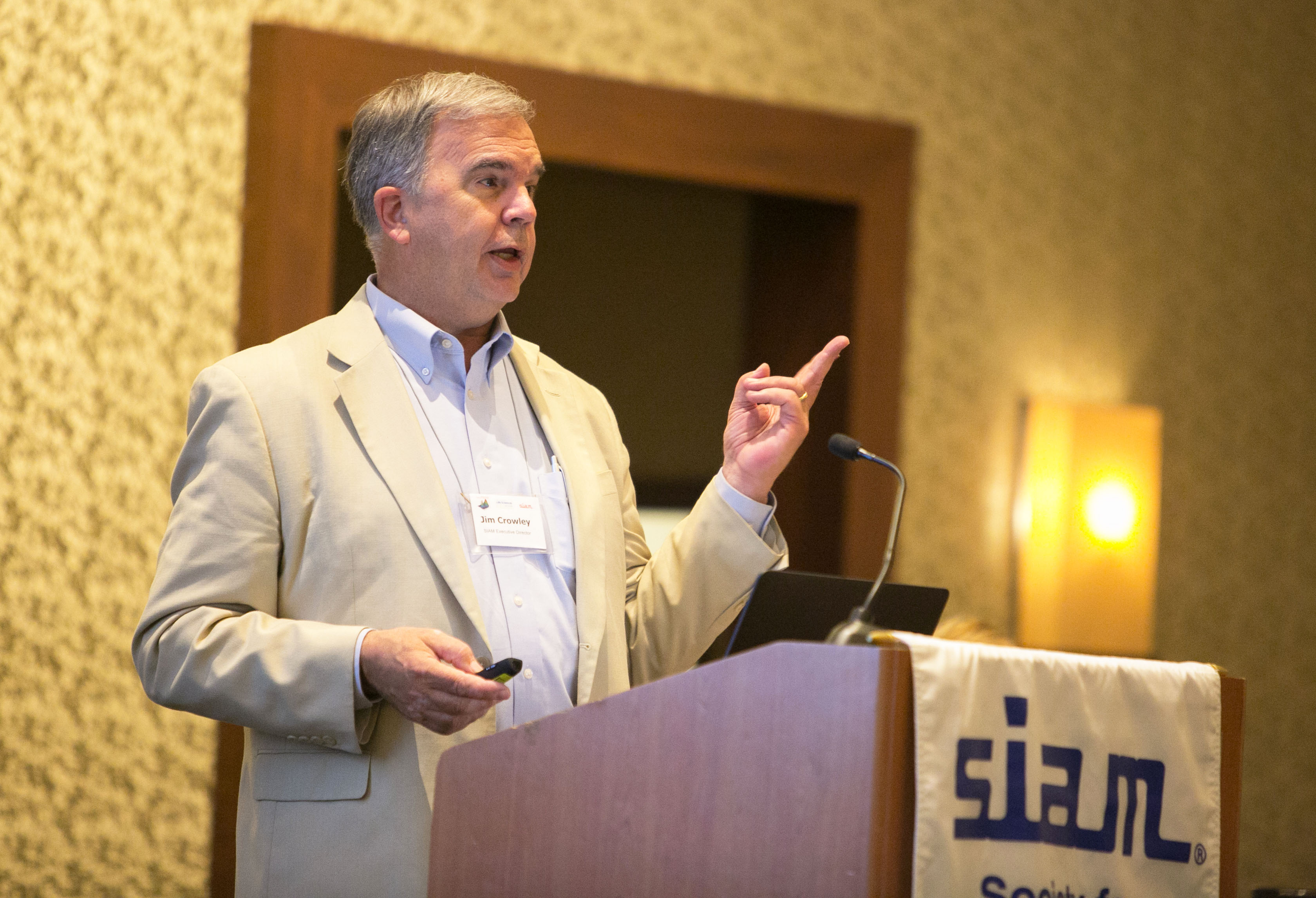 Jim Crowley speaks at the SIAM Business Meeting during the 2016 SIAM Annual Meeting, which took place in Boston, Mass. SIAM photo.