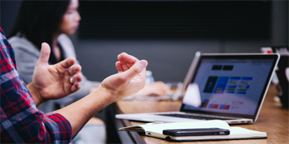 People exchange information by engaging in various types of verbal, nonverbal, and written communication. Public domain image.