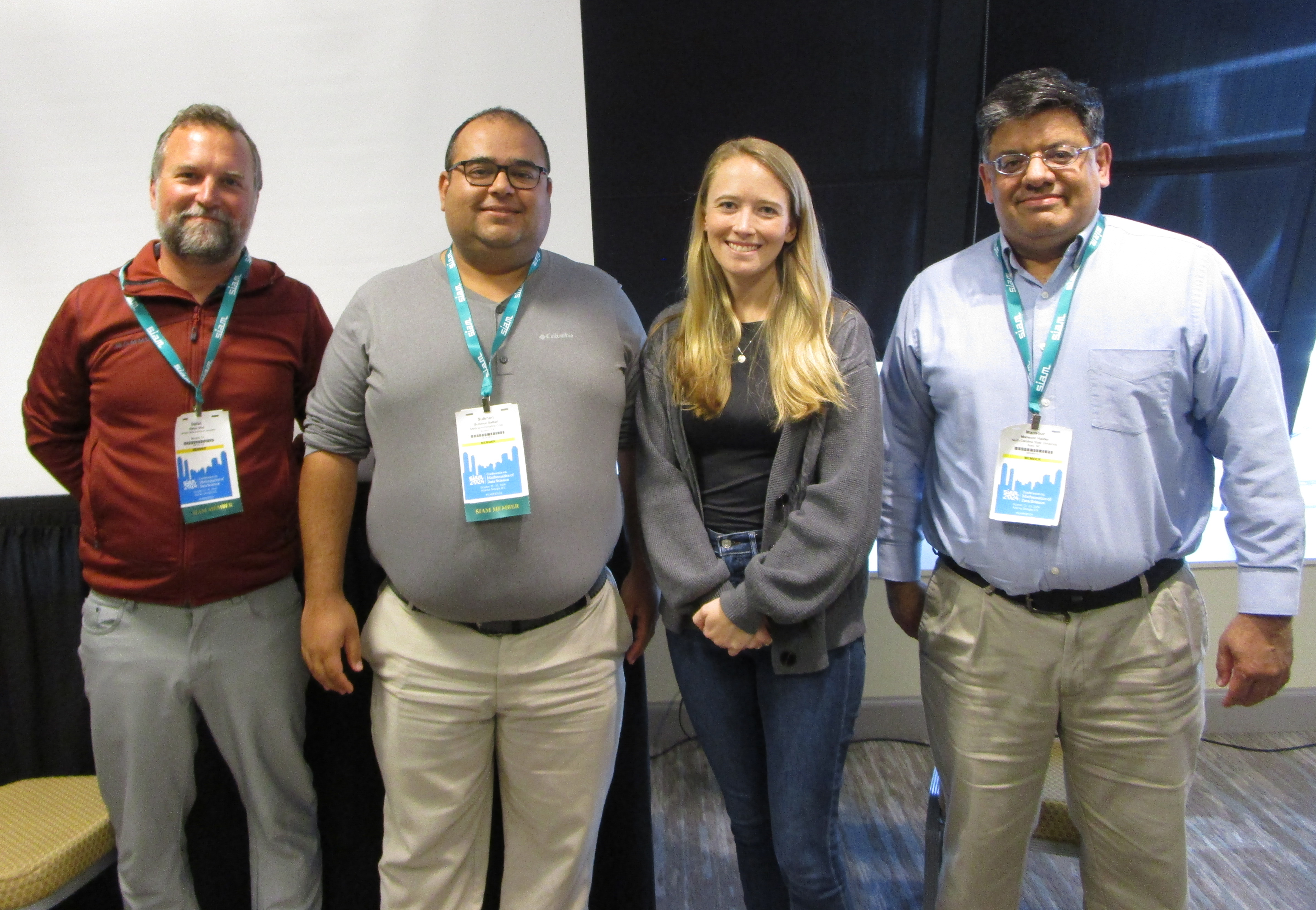 Stefan Wild, Sulimon Sattari, Sarah Tymochko, and Mansoor Haider pose after the mentorship panel at the 2024 SIAM Conference on Mathematics of Data Science.