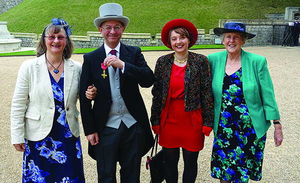 SIAM News editorial board member Chris Budd with (from left) his wife Sue, his daughter Byrony, and his mother Jillian. His son Jeremy was unable to attend the ceremony.