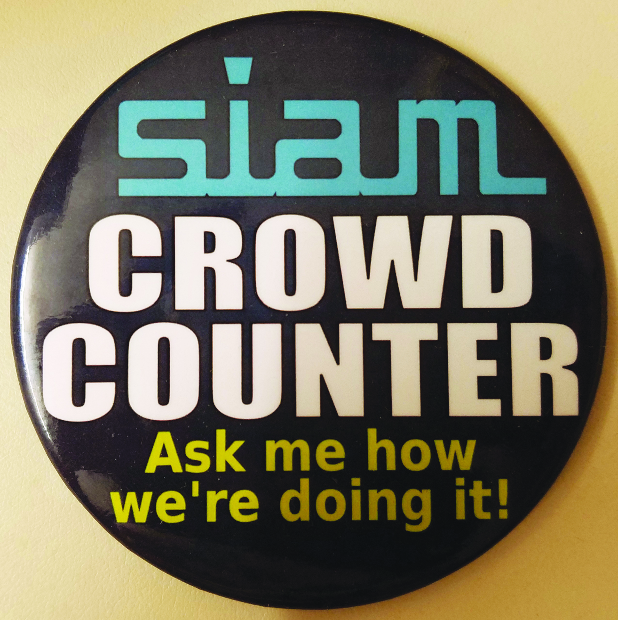 Special SIAM buttons identified student crowd-counting volunteers. Photo credit: Ratna Khatri.