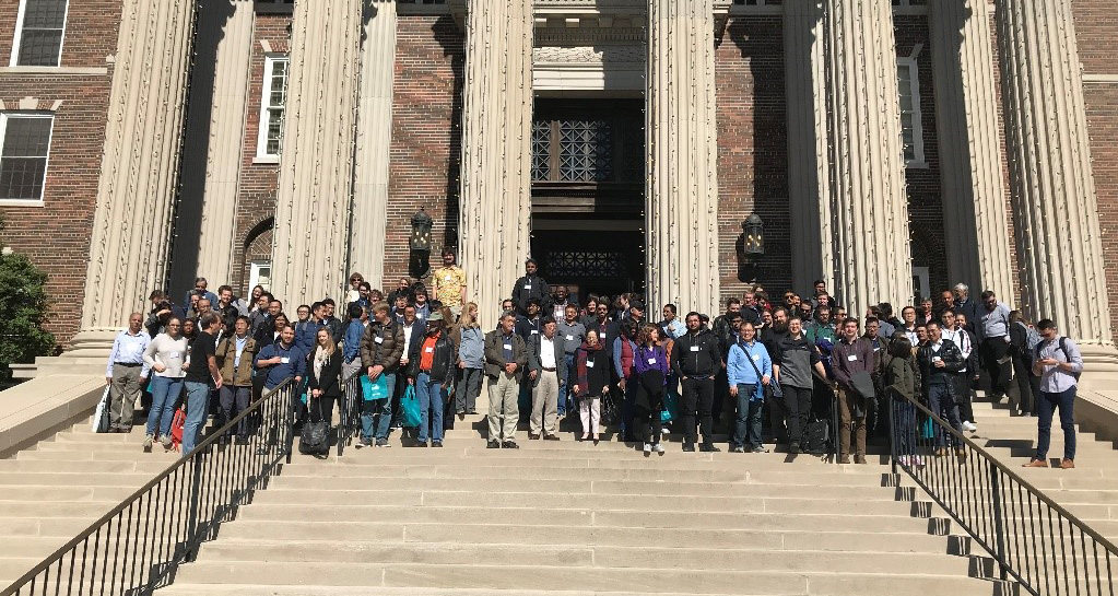 All conference attendees gather outside of Dallas Hall at Southern Methodist University.