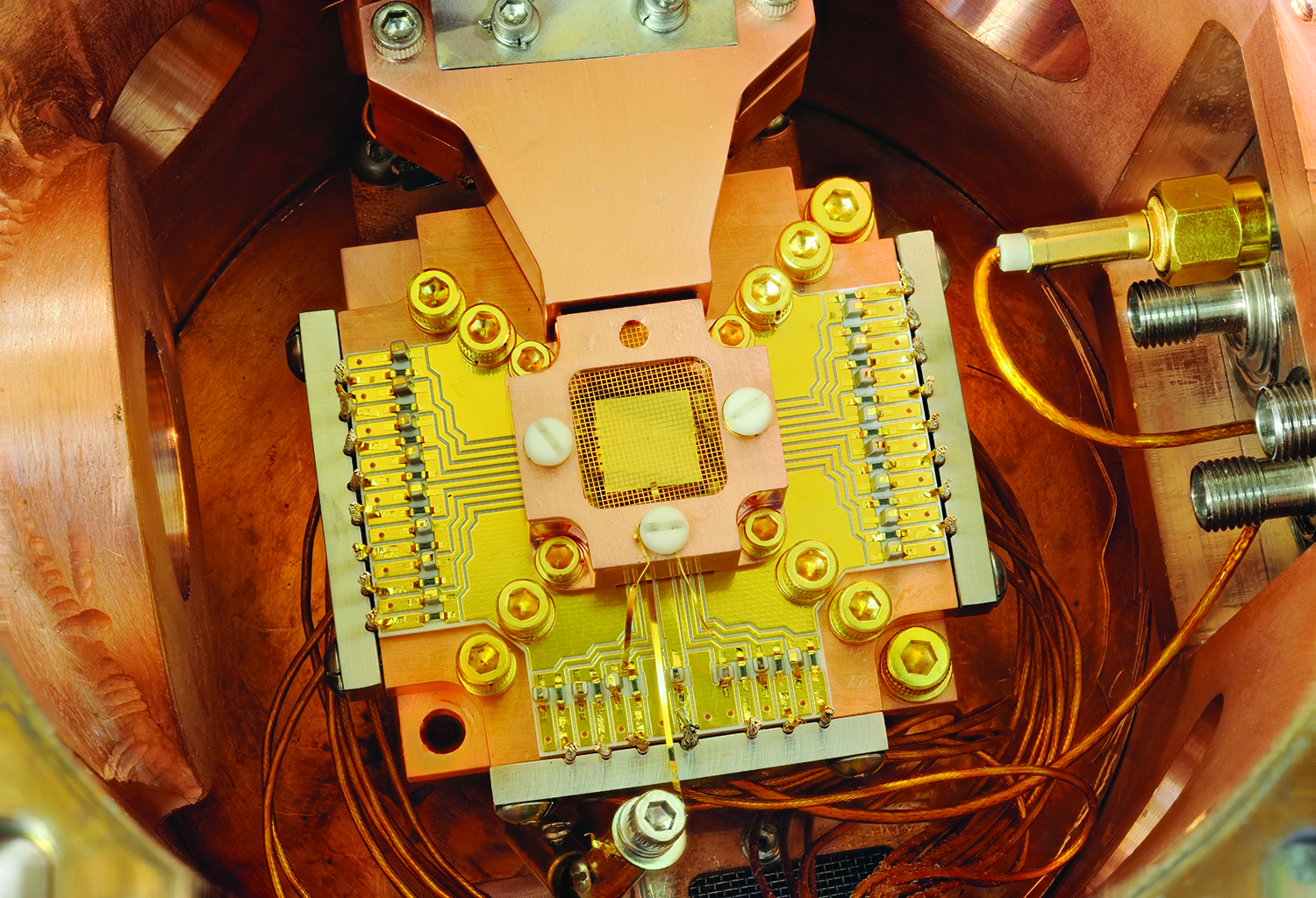 &lt;strong&gt;Figure 1.&lt;/strong&gt; Ion trap devices induce the transfer of quantum information between ions to enable information processing in quantum computing. Figure courtesy of &lt;a href=&quot;https://www.nist.gov/image/quantumcomputingiontrappingjpg&quot; rel=&quot;noopener noreferrer&quot; target=&quot;_blank&quot;&gt;Y. Colombe/ National Institute of Standards and Technology&lt;/a&gt;.