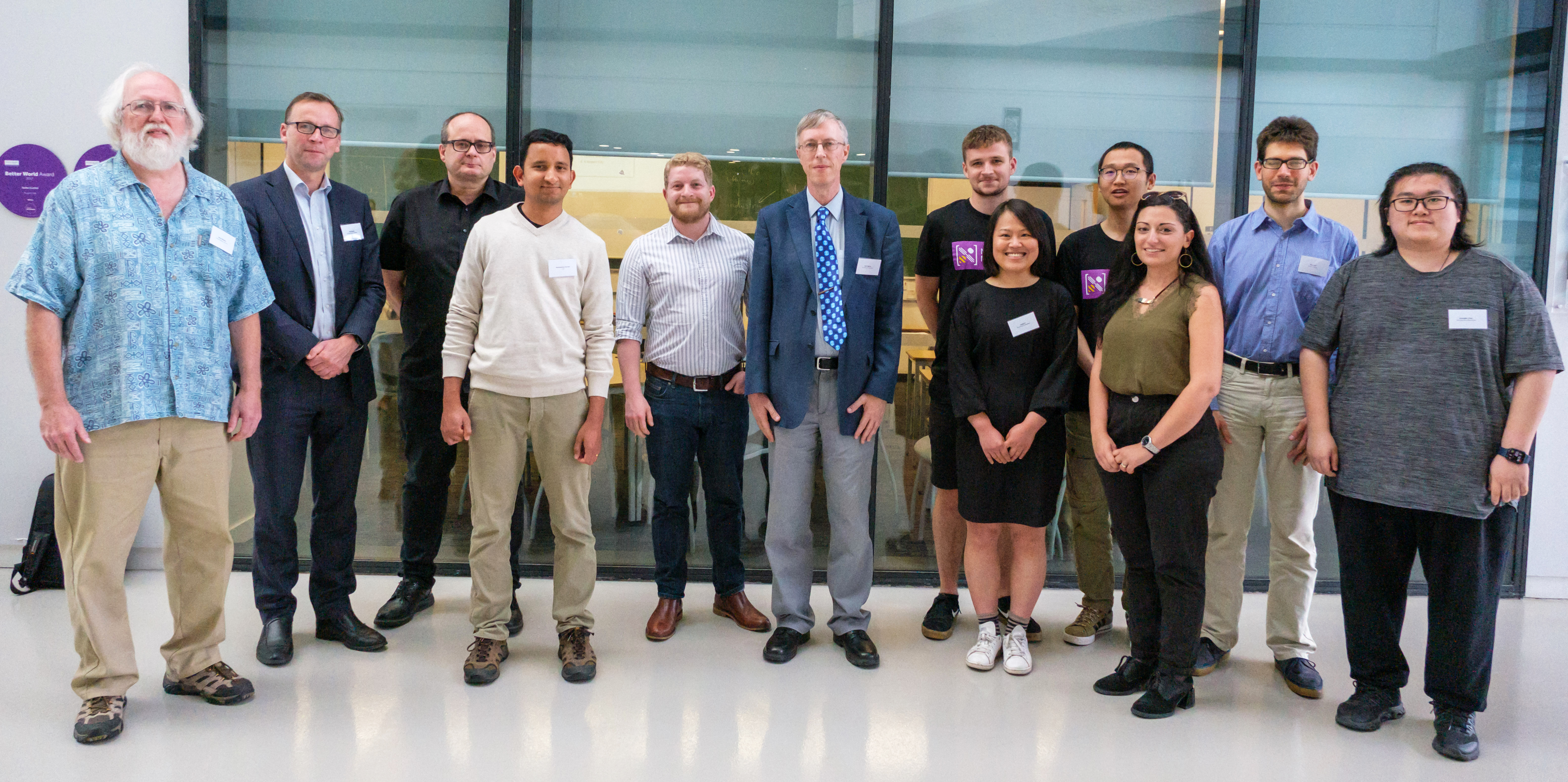 Nick Higham (sixth from left) poses with some former Ph.D. students at the conference on “Advances in Numerical Linear Algebra: Celebrating the 60th Birthday of Nick Higham,” which took place at the University of Manchester in July 2022. Attendees of this international workshop came together to honor Nick’s birthday and discuss current developments in the field of numerical linear algebra. Photo © Nick Higham.