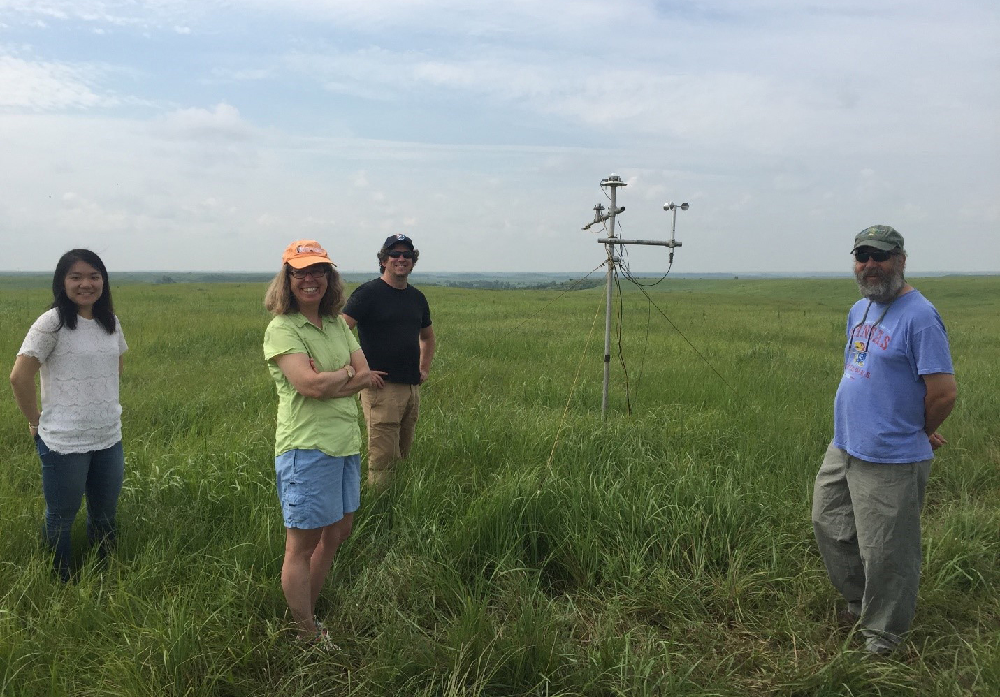 From left: Yuxin Chen (Northwestern University), Mary Silber (University of Chicago), Nate Brunsell (University of Kansas), and Erik Van Vleck (University of Kansas) visit the Konza Prairie Biological Station. Photo credit: Karna Gowda.