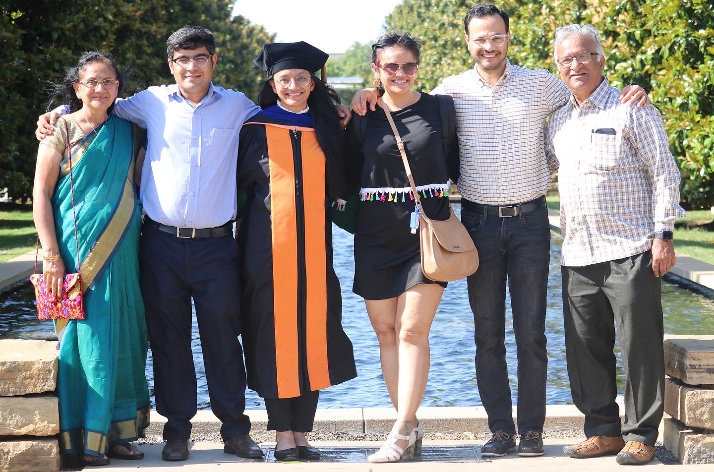 Vrushaly Shinglot (third from left) gathers with her family to celebrate her graduation from the University of Texas at Dallas with a Ph.D. in applied mathematics. Photo courtesy of the author.