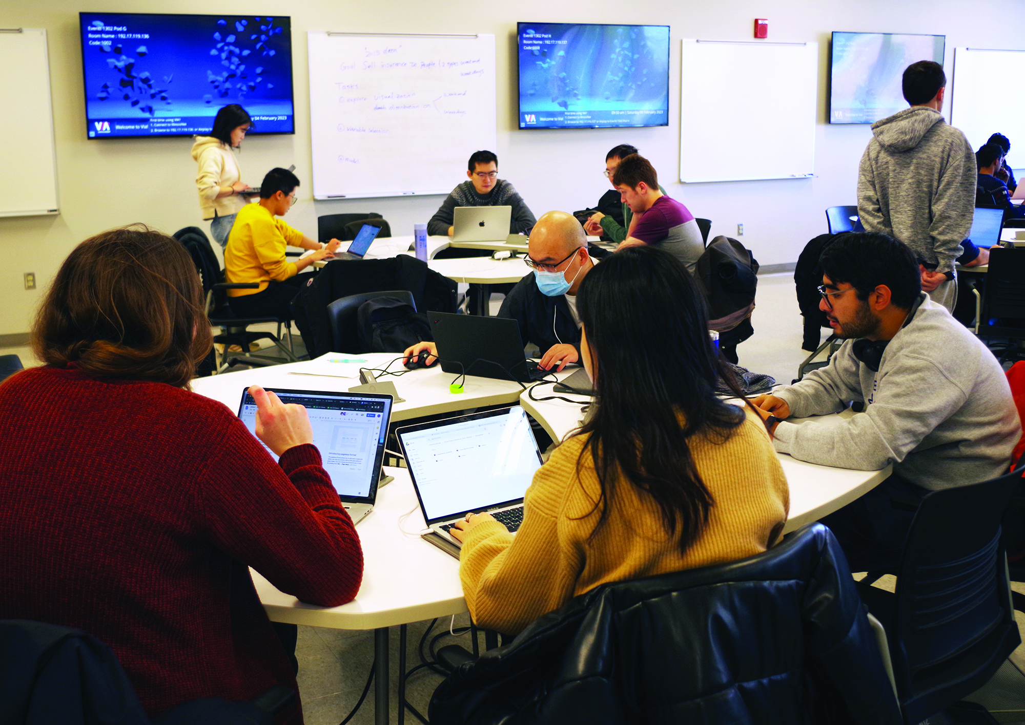 Students tackle open-ended projects in mathematical modeling and data science during the capstone “Project Workshop” of the Internship Network in the Mathematical Sciences (INMAS), which took place in February 2023. Photo courtesy of the Department of Mathematics at the University of Illinois Urbana-Champaign.